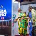 Asantehene Otumfuo Osei Tutu II unveils the commemorative anniversary book, 70 Years of Global Impact, which featured Telecel CEO, Ing. Patricia Obo-Nai.