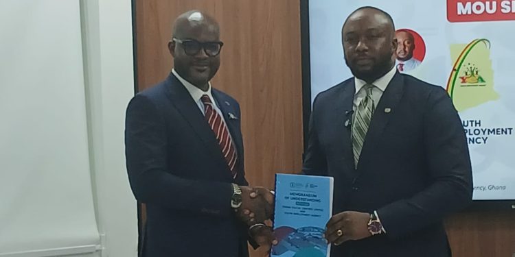 Chief Executive Officer of Ghana Digital Centres Limited, Dzifa Gunu(right)  YEA Chief Executive Officer, Malik Basintale(left)