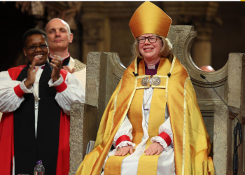 Archbishop of Canterbury, Sarah Mullally [seated]