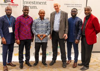 Ras Mubarak, Founder and Leader of the Pan African Initiative Promoting a Visa-Free Africa by 2030 [middle] in African print.