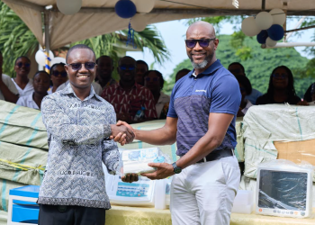David Johnson, Director, External Relations and Communications at Newmont (right), handing over the equipment to Prof. Gordon Abeka Nkrumah (left), Hospital Management Committee Chair of the University of Ghana Health Services.