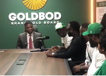 Award-winning Ghanaian dancehall artiste Shatta Wale and his team, including rapper Medikal [right], with the Chief Executive Officer of the Ghana Gold Board, Sammy Gyamfi, and his team [left].