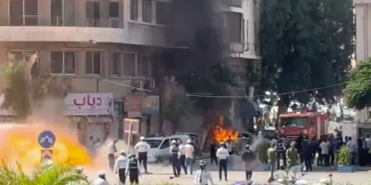 Smoke and fire rise at a site where explosive devices blew up in Damascus [Yamam Al Shaar/Reuters]