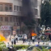 Smoke and fire rise at a site where explosive devices blew up in Damascus [Yamam Al Shaar/Reuters]