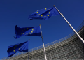 European Union flags flutter outside the European Commission headquarters in Brussels, Belgium Februrary 26, 2026. REUTERS/Yves Herman Purchase Licensing Rights