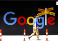 A man walks past a logo of Google in front of at an office building in Zurich, Switzerland July 1, 2020. REUTERS/Arnd Wiegmann Purchase Licensing Rights