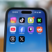 Instagram, TikTok, Snapchat, Kick, YouTube, Facebook, Twitch, Reddit, Threads and X applications are displayed on a mobile phone in this picture illustration taken on December 9, 2025. REUTERS/Hollie Adams/Illustration Purchase Licensing Rights