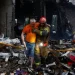 Photo credit: Reuters.
Kyiv emergency services were pulling survivors out of bombed-out buildings following early morning strikes on Monday